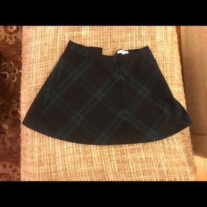 GREEN/BLACK PLAID SKIRT